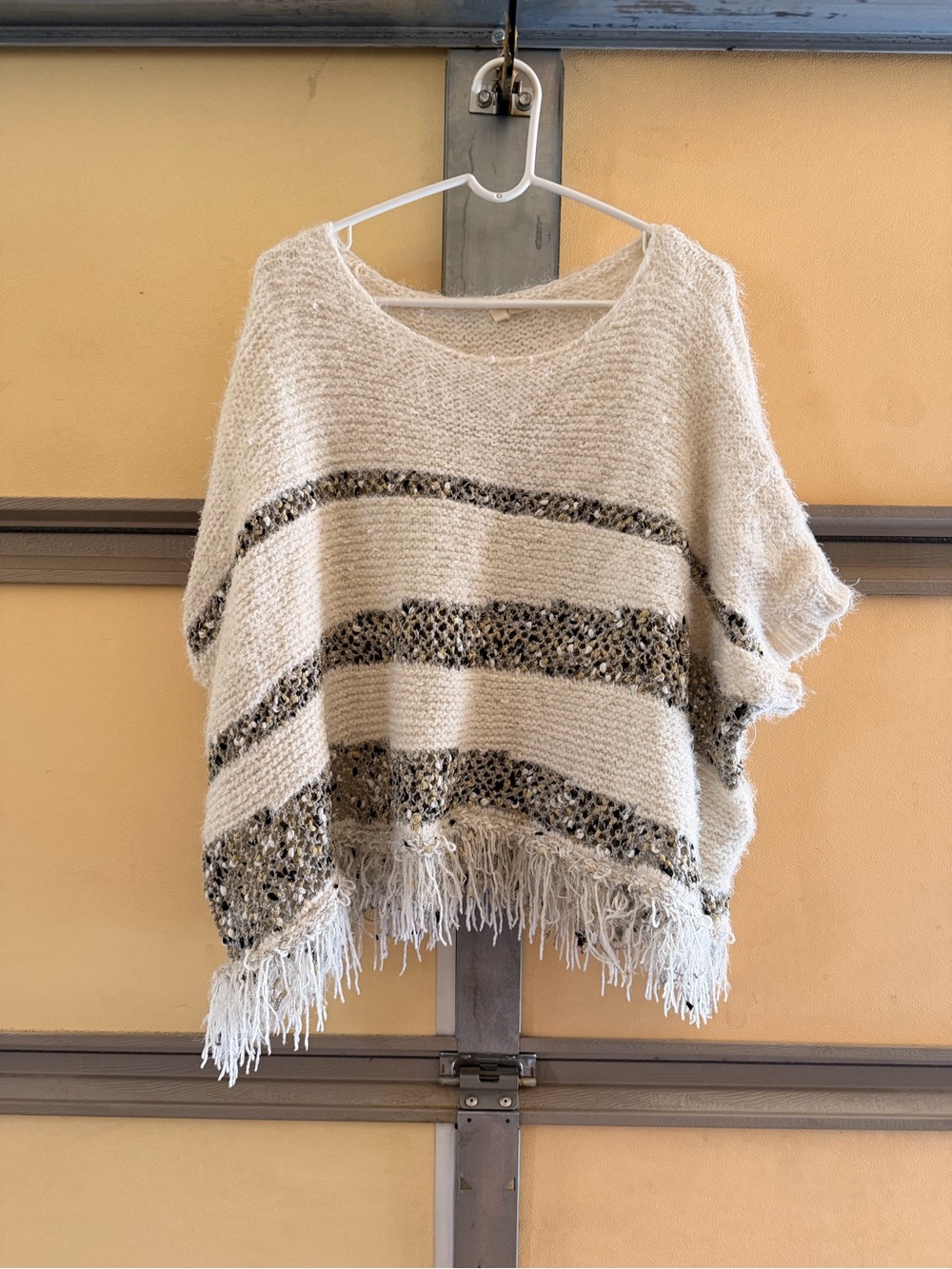 Anthropologie Cream Knit Fringe Poncho with Metallic Stripe Detail